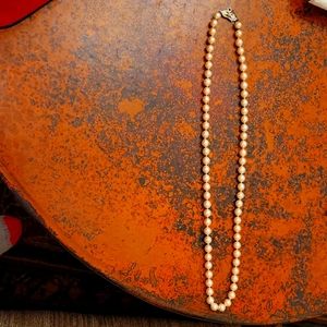 Ladies 8.0mm Matinee length (27") strand of pearls each knotted in between.